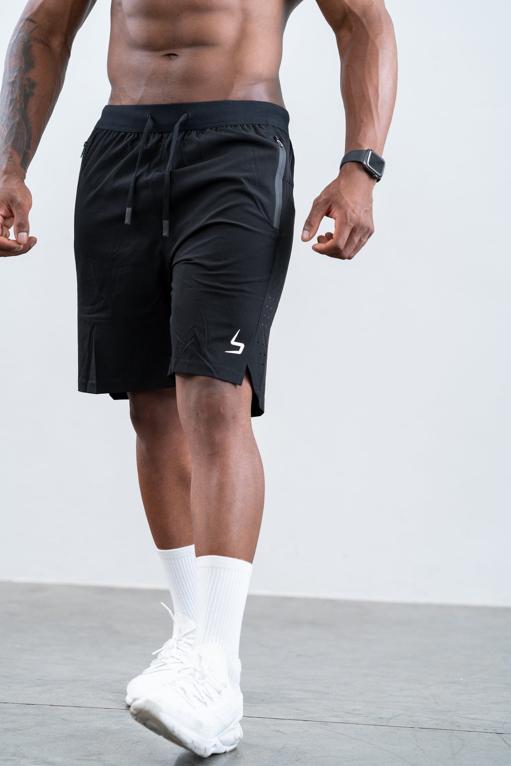 man wearing botthms black training sport short